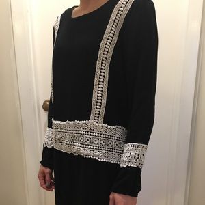 Black tunic with white patterned lace